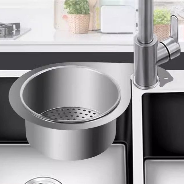 Stainless steel sink strainer on a kitchen sink