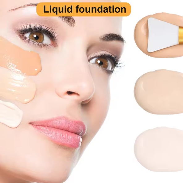 Close-up of a woman's face with liquid foundation application and a makeup brush.